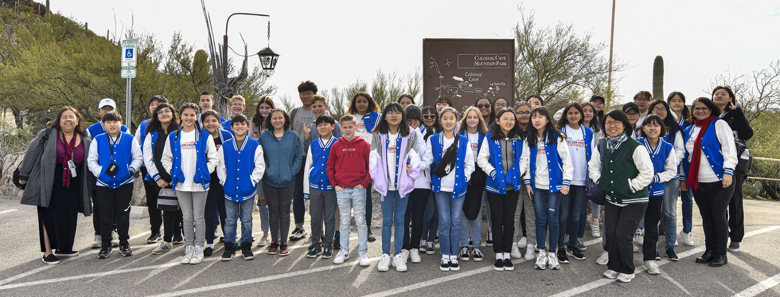 Korean Students At Colossal Cave Sign